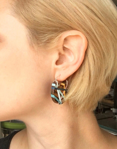 Wearing Wood Jewelry Hoop Earrings with Primary Colors