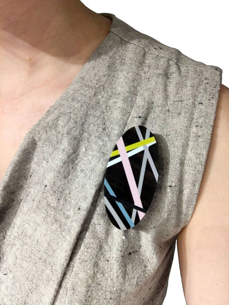Wearing a Wood Brooch in Black Ebony with Resin Inlay 
